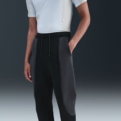Pánské flísové kalhoty Nike Tech Color-Block s otevřeným lemem
