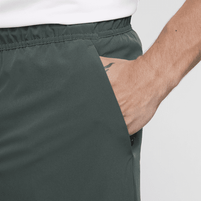 Pants versátiles Dri-FIT de pierna entallada para hombre Nike Unlimited