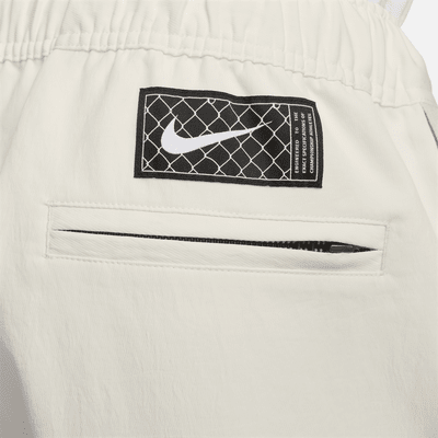 Pants de básquetbol de apertura lateral para hombre Nike