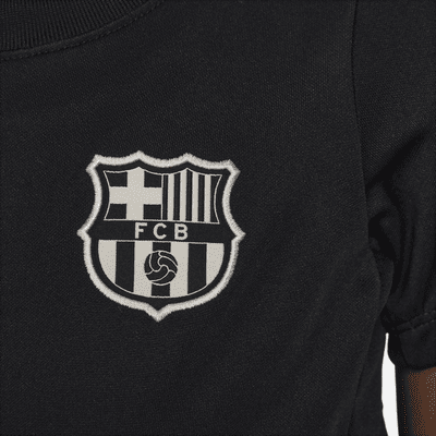 FC Barcelona Academy Nike Dri-FIT Fußball-Kurzarmshirt für jüngere Kinder