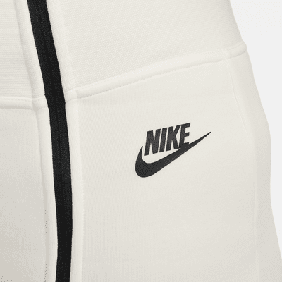Nike Sportswear Tech Fleece Women's High-Waisted Slim Zip Trousers. Nike VN