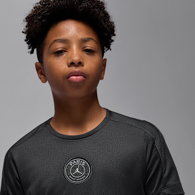 Haut de foot à manches courtes Jordan Dri-FIT Paris Saint-Germain Strike 4e tenue pour ado