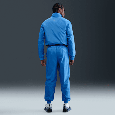 Tuta in tessuto Nike Club – Uomo