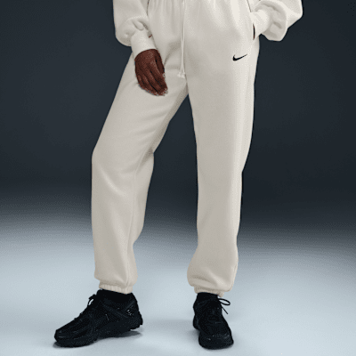 Pants de entrenamiento oversized de tiro alto para mujer Nike Sportswear Phoenix Fleece