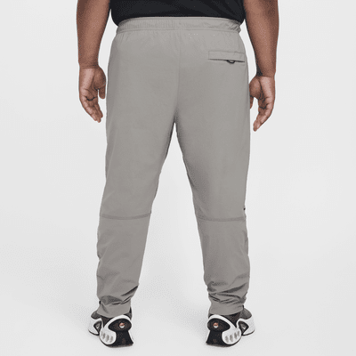 Męskie spodnie z tkaniny Nike Tech