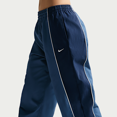 Damskie spodnie dresowe o kroju oversize ze średnim stanem Nike Sportswear