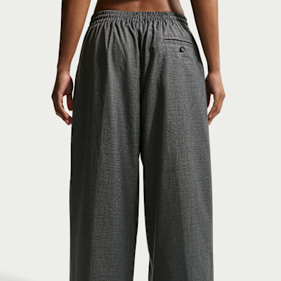 Pants de tejido Woven de tiro medio oversized para mujer Nike Sportswear