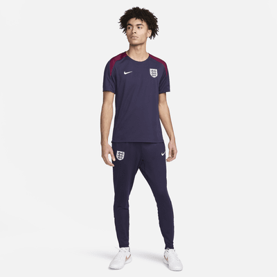 Fotbollsbyxor England Strike Nike Dri-FIT i stickat material för män