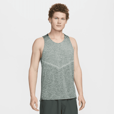 Royalty-Free photo: Man wearing white tank top and black fitted