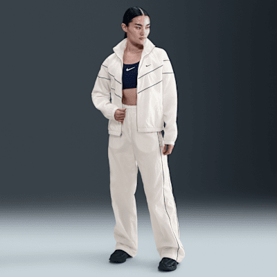 Nike Windrunner Chaqueta de tejido Woven y ajuste holgado con cremallera completa y protección UV - Mujer