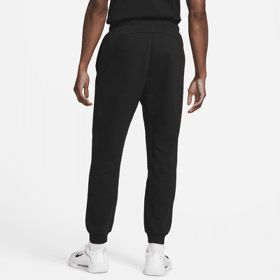 Calças de ténis em tecido moletão NikeCourt Heritage para homem