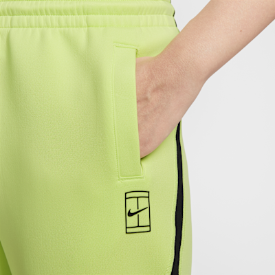 กางเกงเทนนิสเอวปานกลางผู้หญิง Dri-FIT Nike Advantage