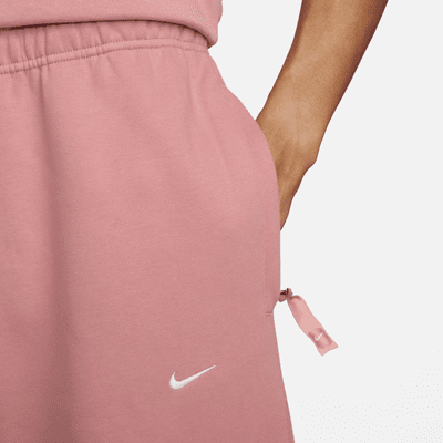 Pants de tejido Fleece con dobladillo abierto para hombre Nike Solo Swoosh