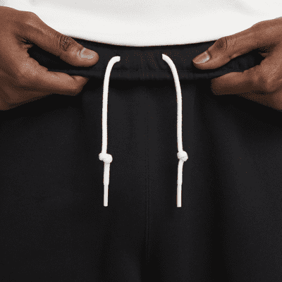 Nike Solo Swoosh Pantalons de teixit Fleece - Home