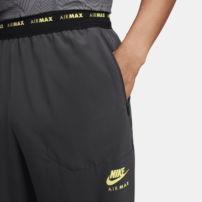 Nike Air Max Men's Dri-FIT Woven Trousers. Nike UK