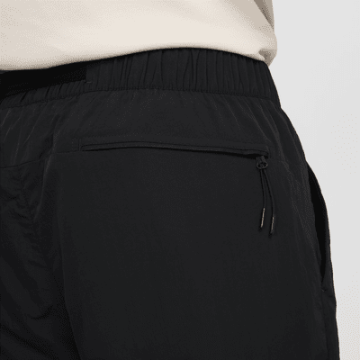 Pantaloni cargo in tessuto Nike Tech – Uomo