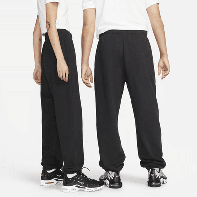 Pants de entrenamiento oversized de tiro medio para mujer Nike Sportswear Club Fleece