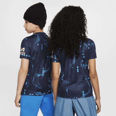 Camisola de futebol de manga curta do equipamento de aquecimento Nike Dri-FIT Academy Pro Chelsea FC Júnior