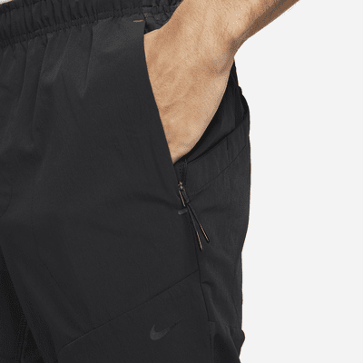 Nike APS Men's Dri-FIT ADV Woven Versatile Trousers. Nike NL