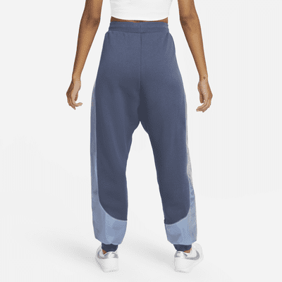 Pantalones de entrenamiento de tejido Fleece con gráficos para mujer Nike Sportswear