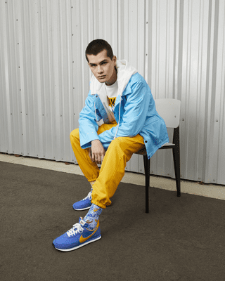 nike blue and yellow trainers