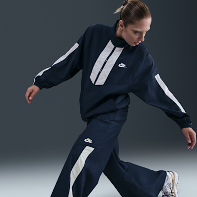 Pants de tejido Woven de pierna ancha para mujer Nike Sportswear
