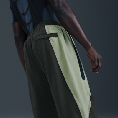 Pantaloni oversize in tessuto Dri-FIT con blocchi di colore Nike Tech – Uomo