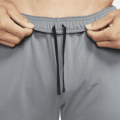 Nike Dri-FIT Challenger Pantalons de teixit Knit de running - Home