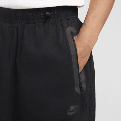 กางเกงขายาวทรงเปิดชายแบบทอผู้ชาย Nike Tech