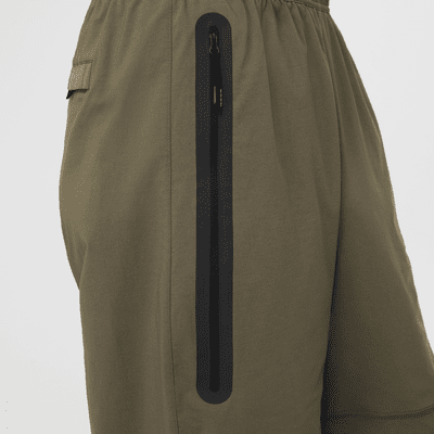 กางเกงขายาวทรงเปิดชายแบบทอผู้ชาย Nike Tech