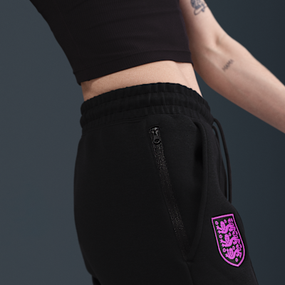 Engeland Tech Nike voetbaljoggingbroek van fleece met halfhoge taille voor dames