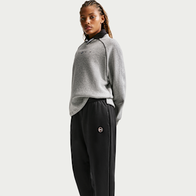 Pants con gráfico de tiro alto oversized para mujer Nike Sportswear Phoenix Fleece