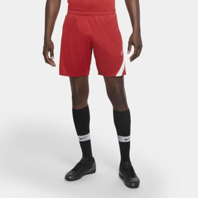 red nike football shorts