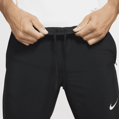 nike essential woven running trousers