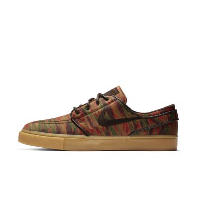 nike sb janoski camo  and  white canvas skate shoes