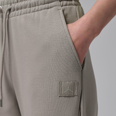 กางเกงขายาวทรงขาบานผู้หญิง Jordan Flight Fleece