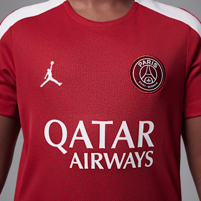 Paris Saint-Germain Strike Fourth Older Kids' Jordan Dri-FIT Football Knit Short-Sleeve Top