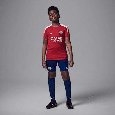 Paris Saint-Germain Strike Fourth Older Kids' Jordan Dri-FIT Football Knit Short-Sleeve Top
