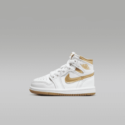 Gold nike shop baby shoes