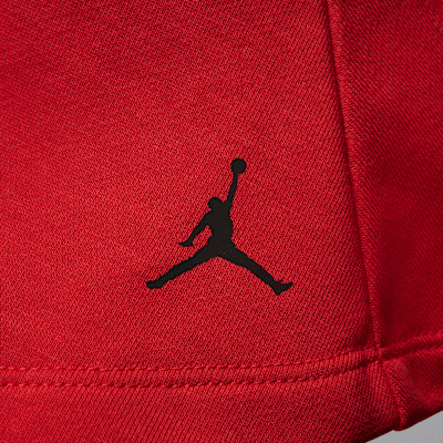 Completo in 2 pezzi con skort a pieghe Jordan – Bambino/a