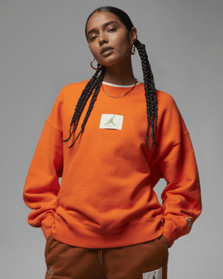 Nike essentials crew neck sweatshirt in orange sales