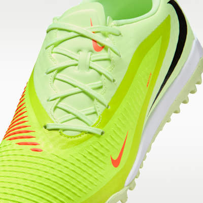 Nike Phantom 6 Low Academy-fodboldsko til grus