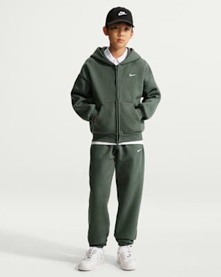 Детские Nike Solo Swoosh Kids' Fleece Cuffed Basketball Pants для баскетбола