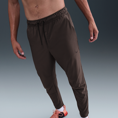Nike Unlimited Dri-FIT Fermuarlı Paçalı Çok Yönlü Erkek Eşofman Altı görsel 2