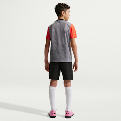 Chelsea F.C. Academy Pro SE Older Kids' Nike Dri-FIT Football Pre-Match Short-Sleeve Top