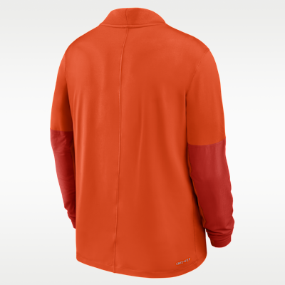 Playera universitaria Nike Dri-FIT de medio cierre para hombre Clemson
