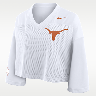Playera universitaria Nike Dri-FIT cropped para mujer Texas Jersey