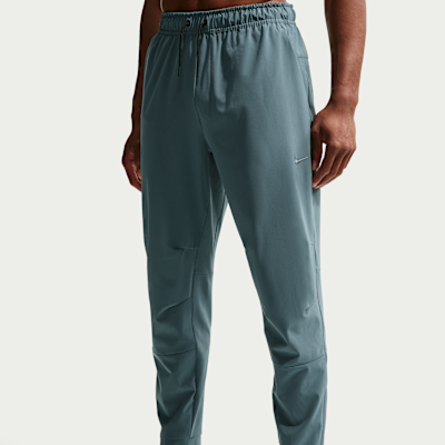 Nike Unlimited Dri-FIT Fermuarlı Paçalı Çok Yönlü Erkek Eşofman Altı görsel 2
