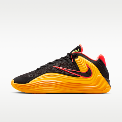 Nike Giannis Freak 7 "Ignition" basketball shoe in Black/Laser Orange/Volt/Bright Crimson colorway, showing lateral profile and Swoosh branding