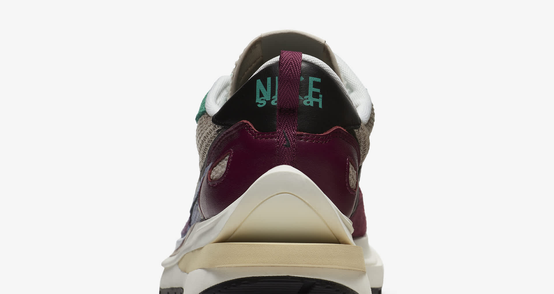 sacai nike villain red
